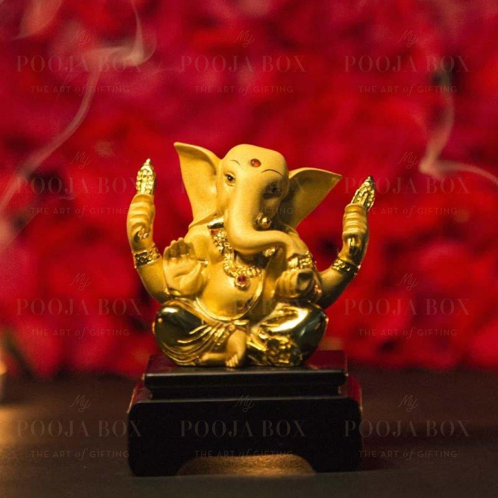 Designer Lord Ganesha Statue On A Wooden Chowki Idols
