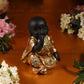 Sitting Baby Monk Figurine In Laughing Pose Feng Shui