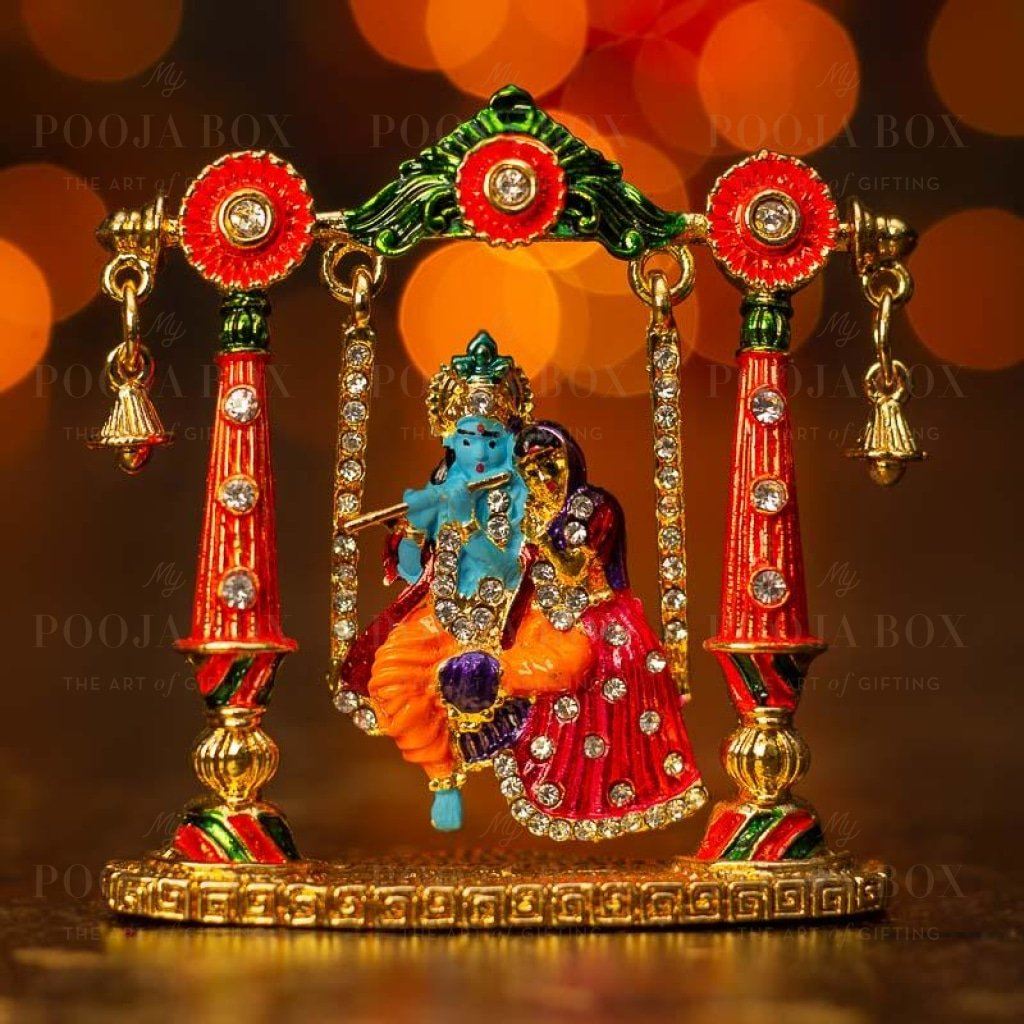Vibrant Radha Krishna Idol With Jhula Idols